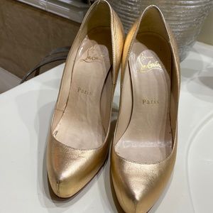 Christian Loubiton size 36 or 6 lightly used rose gold